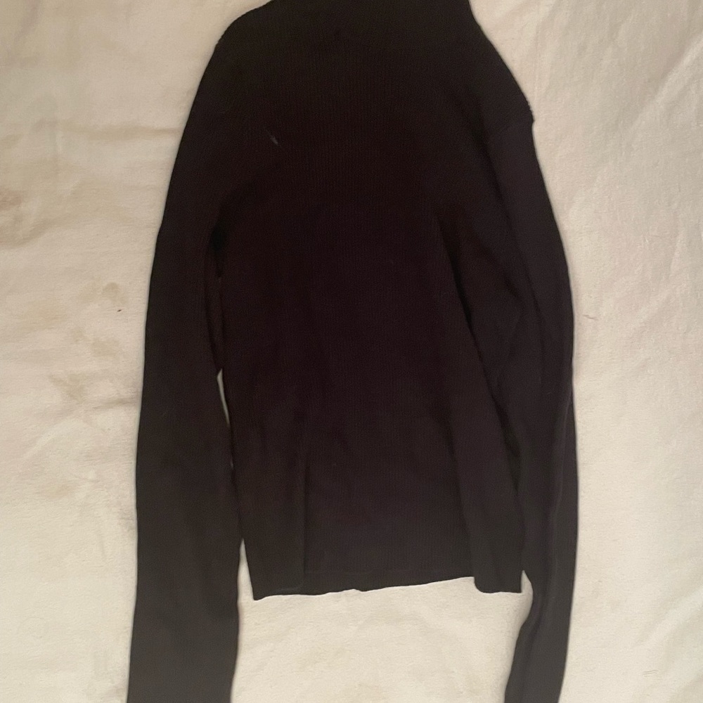 Black long sleeve turtleneck by “divided”